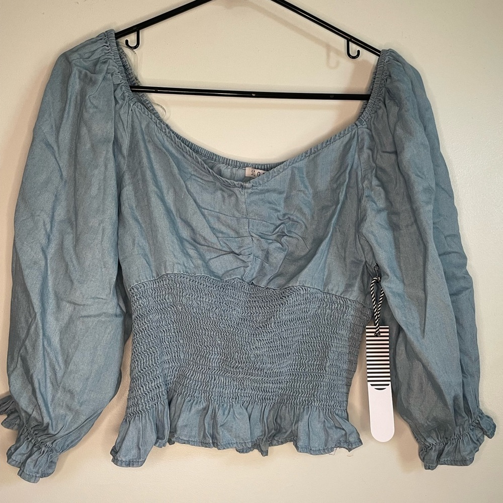 Cute somewhat off the shoulder top from story on